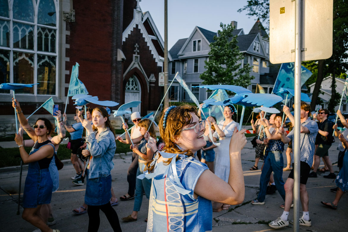 Hattie Grimm (center) at her "Bird Puppet Parade" in Milwaukee, July 1, 2026. (Elliot Young photo)