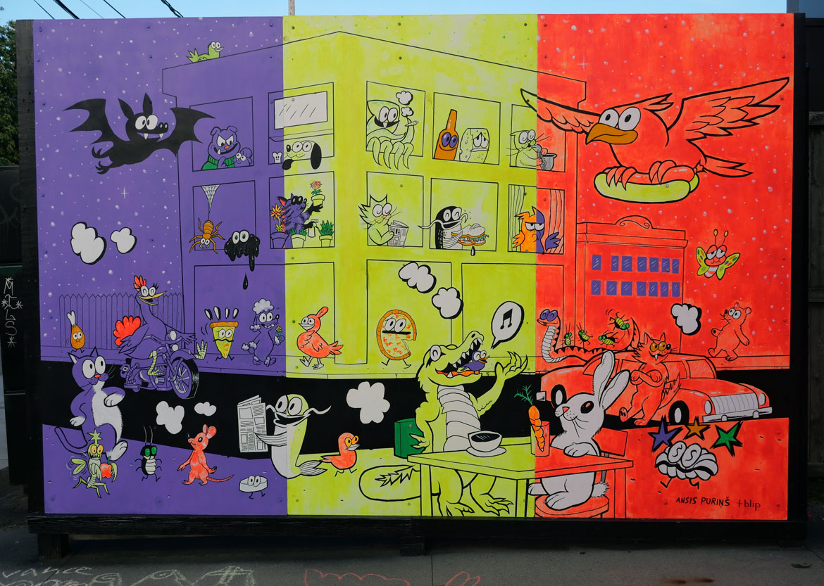 “All This, All at Once” mural by Ansis Puriņš and Blipblipbeep (Jennifer Puriņš) outside the Harvard Ed Portal in Allston, June 2026.
