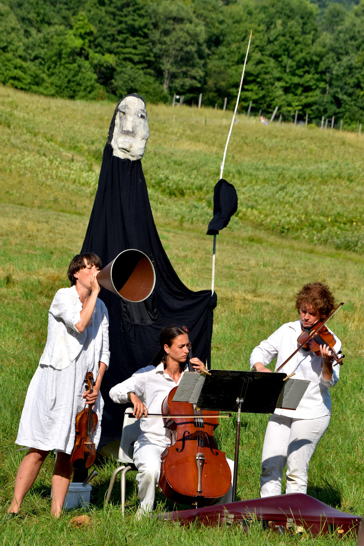 Bread and Puppet Theater's "Upside Down World Resurrection Pageant," performed on their Glover, Vermont, farm, July 26, 2026. (©Greg Cook photo)