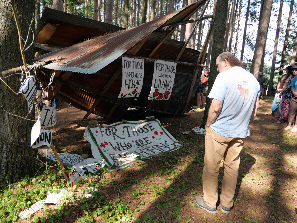 Memorial in the Pine Forest, for Bread and Puppet Theater's "Upside Down World Resurrection Pageant," performed on their Glover, Vermont, farm, July 26, 2026. (©Greg Cook photo)