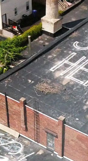 Rooftop of Humphrey Street Studios in Boston during 2019 to 2022 preservation campaign.