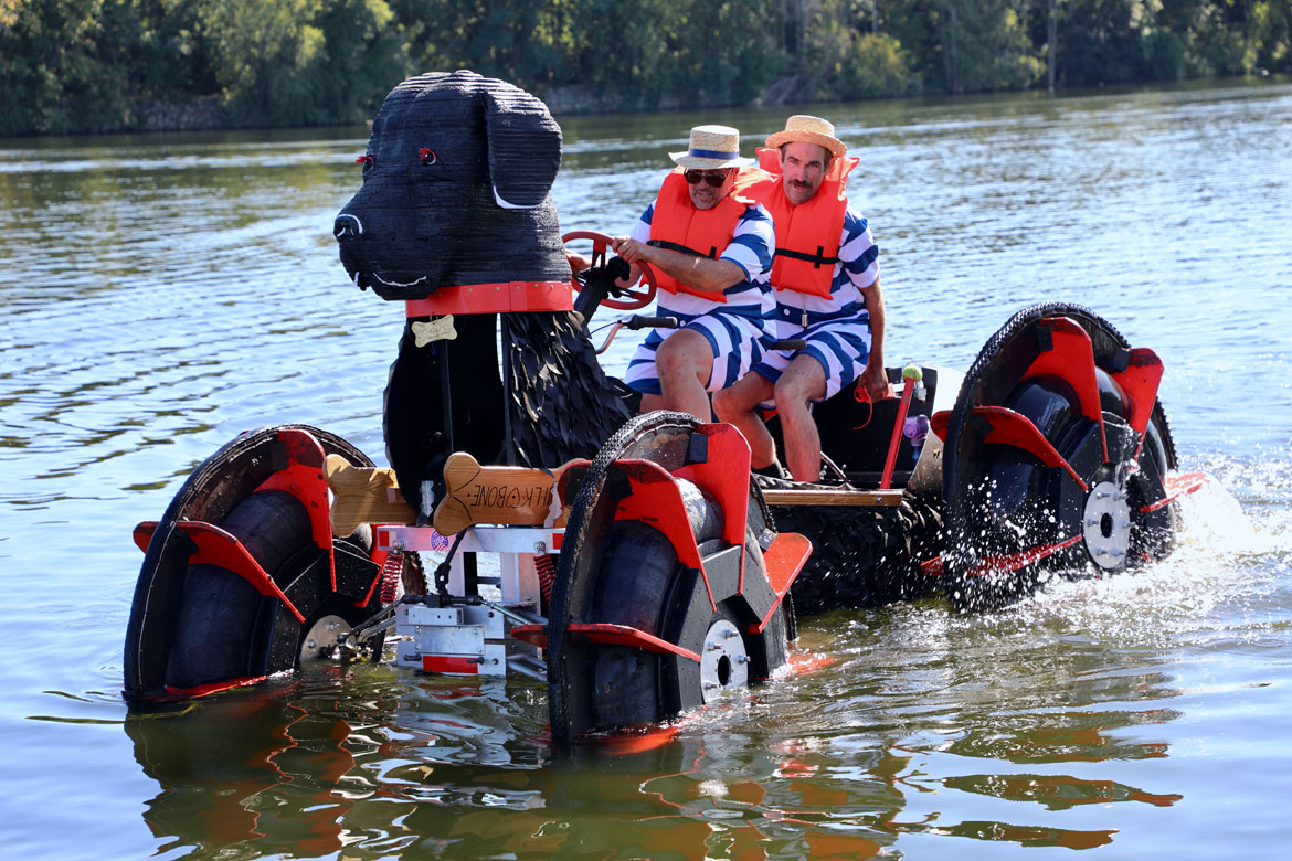2025 Lowell Kinetic Sculpture Race: "Moose," the 1,000-pound Black Dog from Black Dog Builders, doggie paddles the Merrimack River Plunge. (Jen Myers photo)