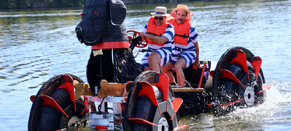 2025 Lowell Kinetic Sculpture Race: "Moose," the 1,000-pound Black Dog from Black Dog Builders, doggie paddles the Merrimack River Plunge. (Jen Myers photo)