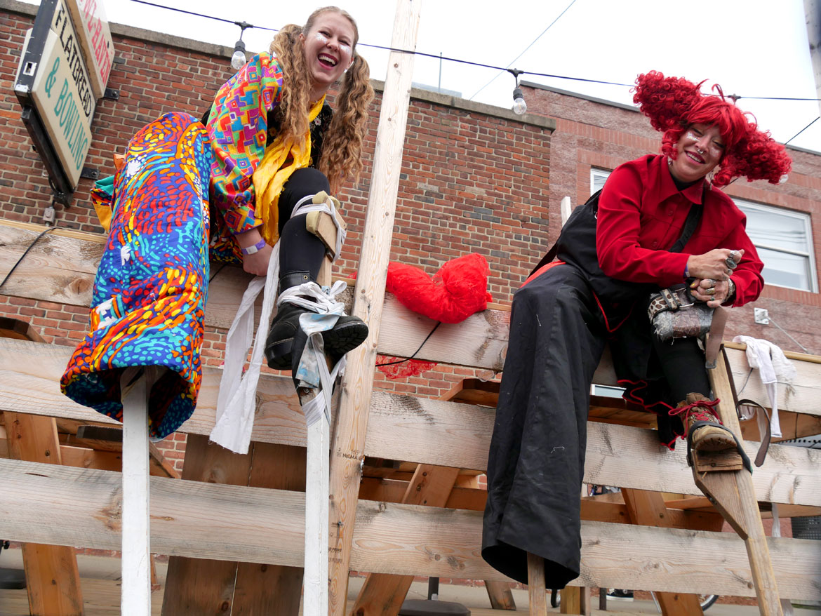 Stilters from Bread and Puppet Theater of Vermont preparing for the Honk Parade, Sunday, Oct. 11, 2026. (©Greg Cook photo)