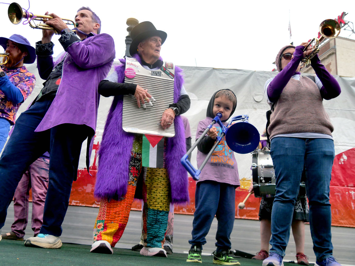 Jamaica Plain Honk Band (JP Honk) from Boston performs on the Honk Festival main stage in Cambridge's Harvard Square, Sunday, Oct. 11, 2026. (©Greg Cook photo)